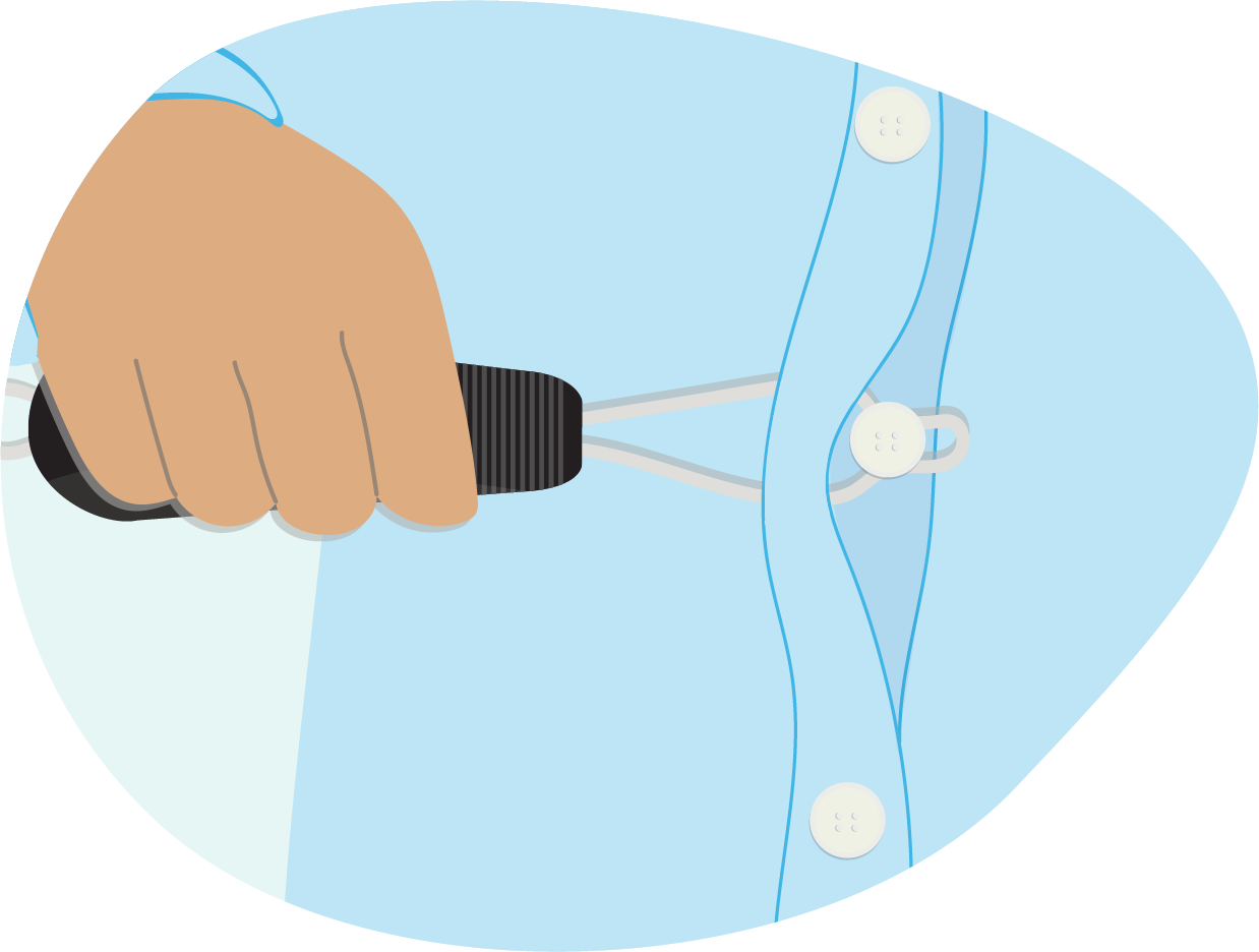 Person using the tool to button a shirt