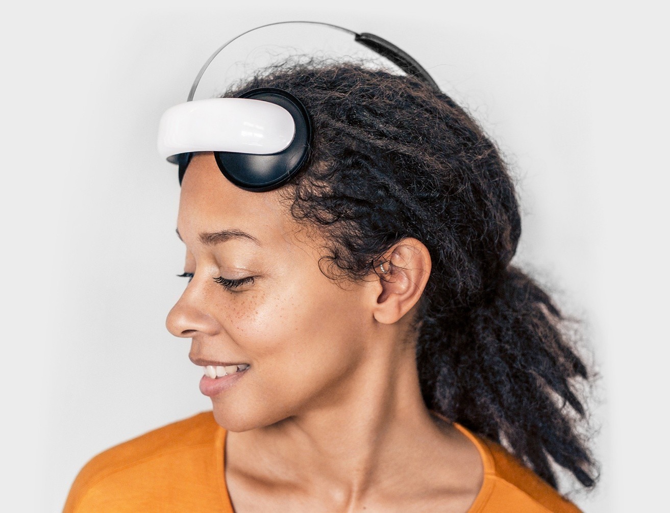 A person with a headset on their head