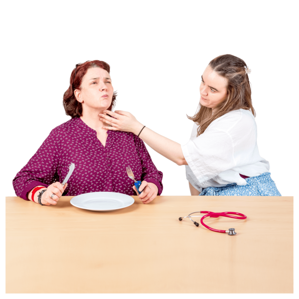 A woman is getting advice on swallowing from a speech and language therapist