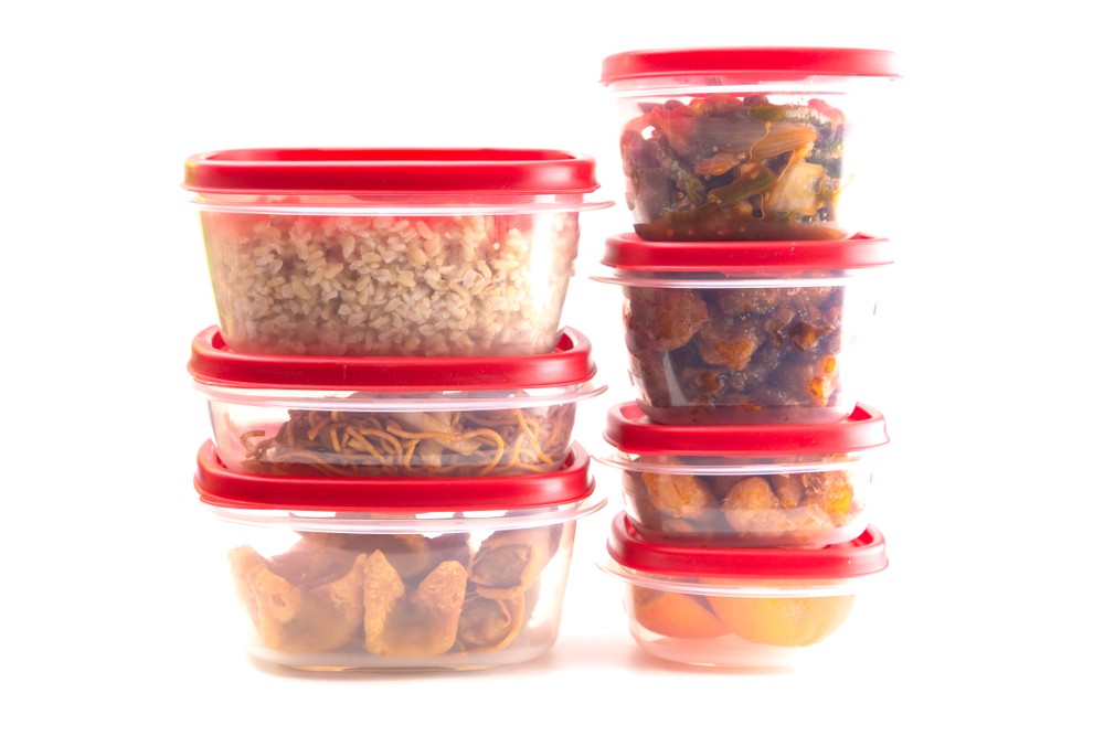 food tubs containing leftovers ready for freezing