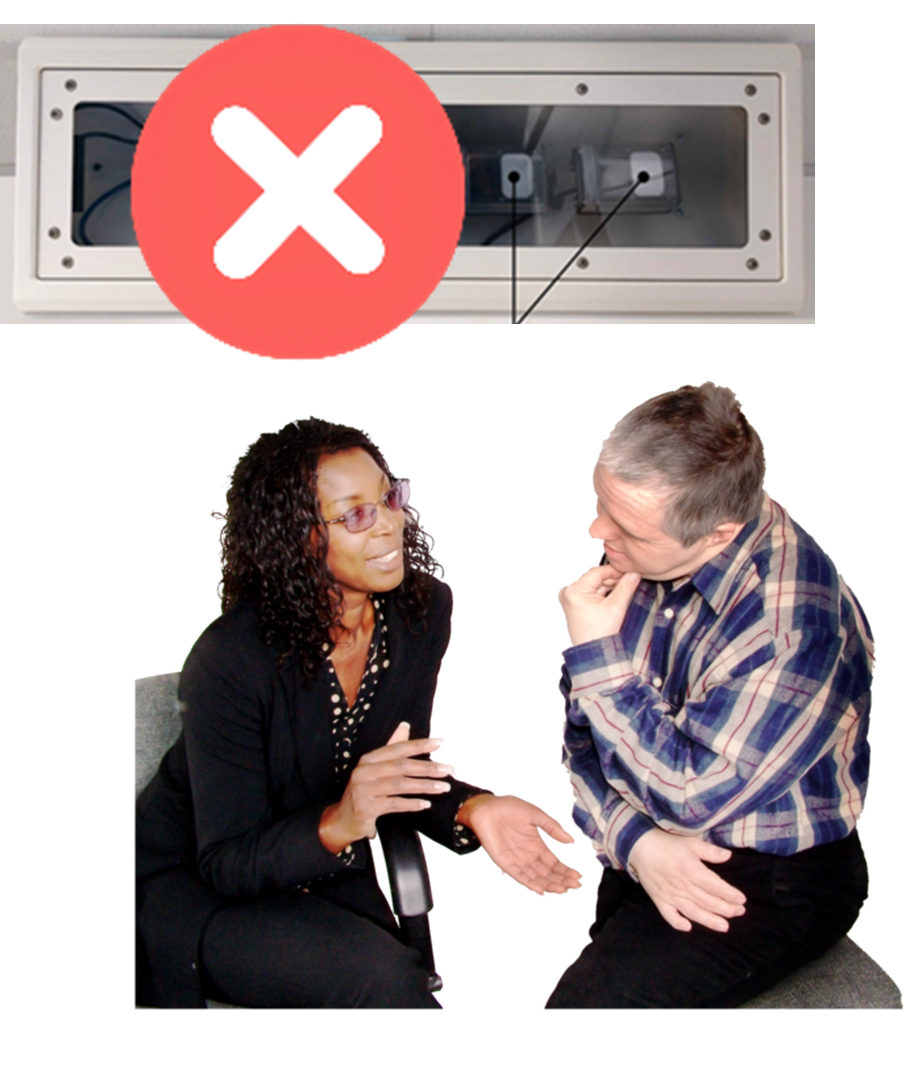 oxevision camera with a red cross over it and two people sitting talking