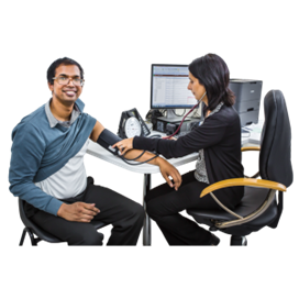 A man getting his blood pressure taken by a GP