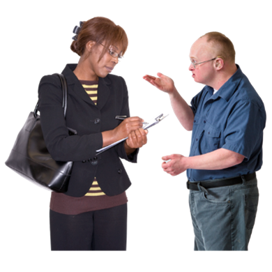 One person talking while another person writes down notes