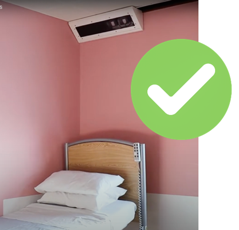 oxevision camera above a bed with a green tick