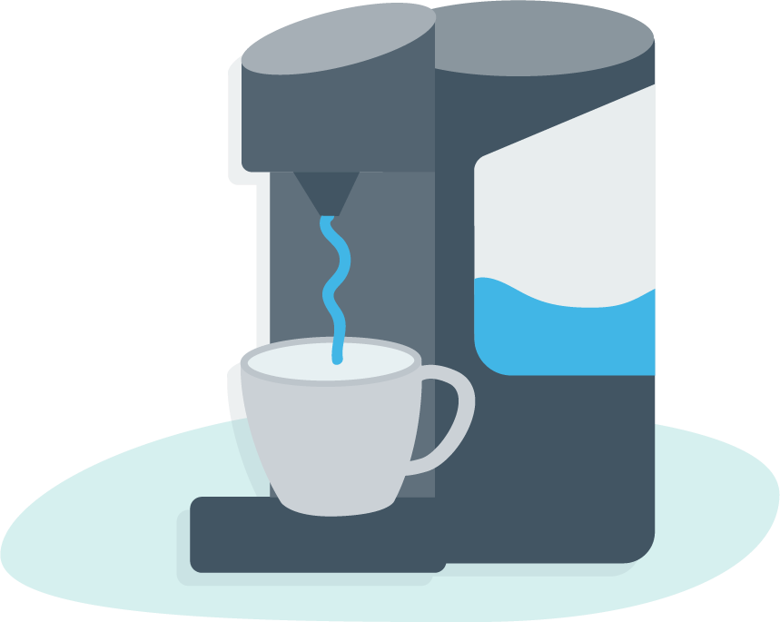 Kettle with a cup underneath the water spout