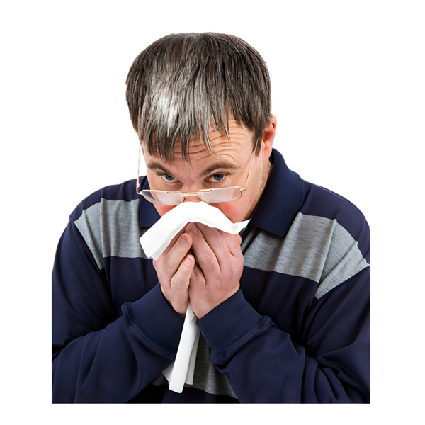Man blowing his nose on a tissue