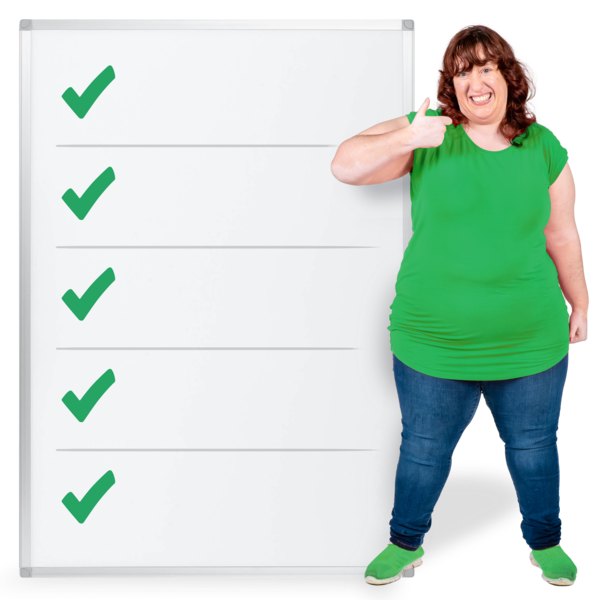 Person holding a checklist sheet with green ticks
