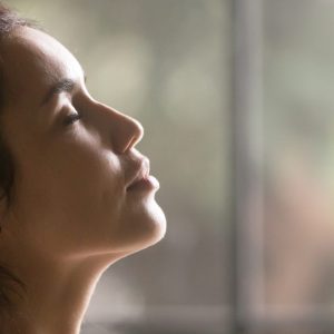 Relaxed lady with eyes closed