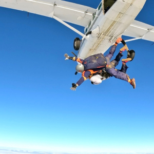 Volunteer braves skydive to raise funds